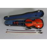 A Chinese violin & two bows (violin 23¾” long), with case.