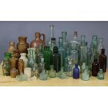 Approximately thirty various glass & stoneware apothecary jars & bottles.