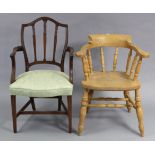 A beech spindle-back captain’s chair, with hard seat & on turned legs with spindle stretchers; & a