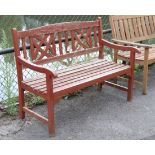 A stained wooden garden bench, 47" wide.