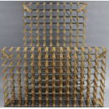 A pine & silvered-metal one hundred & twenty-six division wine-rack, 35” x 53½”; & a ditto one