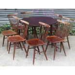 A set of eight Drevounia (Czechoslovakian) spindle-back dining chairs with hard seats, & on round