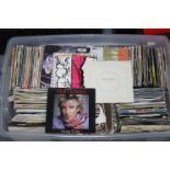 A collection of assorted 45rpm records; & various cd’s.