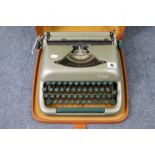 An Erika “Pullman” portable typewriter with case.