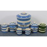 A T. G. Green blue & white banded Cornish ware cylindrical bread bin, 11” high; a pair of ditto