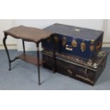 A black japanned-metal travelling trunk with hinged lift-lid & with wrought-iron side handles,