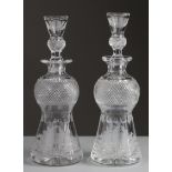 A pair of Edinburgh Crystal Thistle pattern decanters of thistle shape, 32cm & 31cm high, each