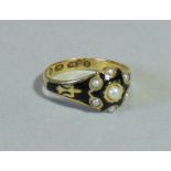 A mid-Victorian 18ct gold, split-pearl, & black enamel mourning ring, Birmingham hallmarked for