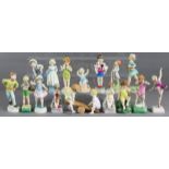 A collection of fourteen Royal Worcester porcelain “Days of the Week” figures of boys & girls,