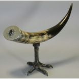 A late 19th/early 20th century Ox horn with silver-plated mount inset oval hardstone cabochon, on