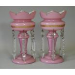 A pair of 19th century white & pink-overlaid glass candle lustres with shaped top-rims, decorated