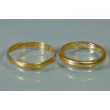 A 22ct gold wedding band, size M, 4.1g; & another, 1.3g (split).