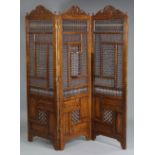 Moorish hardwood three-fold screen with carved, moulded & pierced decoration & hinged central