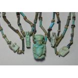 AN ANCIENT EGYPTIAN FAIENCE BEAD NECKLACE, with pendant amulet of the God Pataikos, strung with a