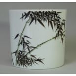 A Chinese porcelain white-glazed brush pot, painted with bamboo stalks & calligraphy, & inscribed