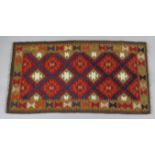A Maimana kilim rug, of ochre ground with central repeating design & wide border, 32” wide x 62”