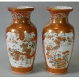 A pair of late 19th century Japanese Kutani porcelain vases, each of baluster form with finely