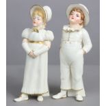 A pair of Royal Worcester porcelain “Kate Greenaway” ivory & gilt standing boy & girl sugar caster