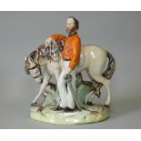 A Victorian Staffordshire pottery figure of Garibaldi, decorated in the round, untitled, 9” high x