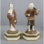 A pair of Royal Worcester porcelain standing male & female Japanese figures decorated in bronzed