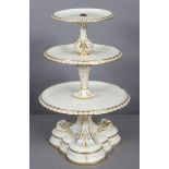 A Worcester (Kerr & Binns) porcelain cake stand of three graduated circular tiers, ivory ground with