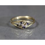 A 9ct gold ring set cluster of four sapphires & three diamonds, size P, 1.8g; & a 9ct gold ring