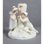 A Royal Worcester porcelain white & gilt ‘fountain’ group, the faces & limbs painted inn coloured