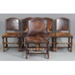 A set of five Cromwellian-style dining chairs (four single &one elbow) with brass-studded tan