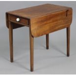 A 19th century mahogany Pembroke table with rounded corners to the drop leaves, fitted drawer to one