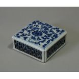 A Chinese blue & white porcelain fragrance box, of square form with pierced sides, decorated with