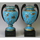 A PAIR OF 19th century CONTINENTAL PALE BLUE OPAQUE GLASS LARGE OVOID VASES with black glass side