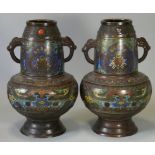 A pair of late 19th/early 20th century Chinese bronze & cloisonné enamel vases, each with all-over