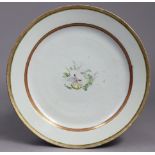 An 18th century Chinese export porcelain famille rose charger, the centre painted with a dove,