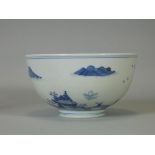 A Chinese blue & white porcelain deep bowl, decorated with mountainous landscape, on short foot; 5¾”