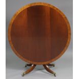 A Geo III inlaid mahogany tilt-top dining table with crossbanded & reeded edge to the circular