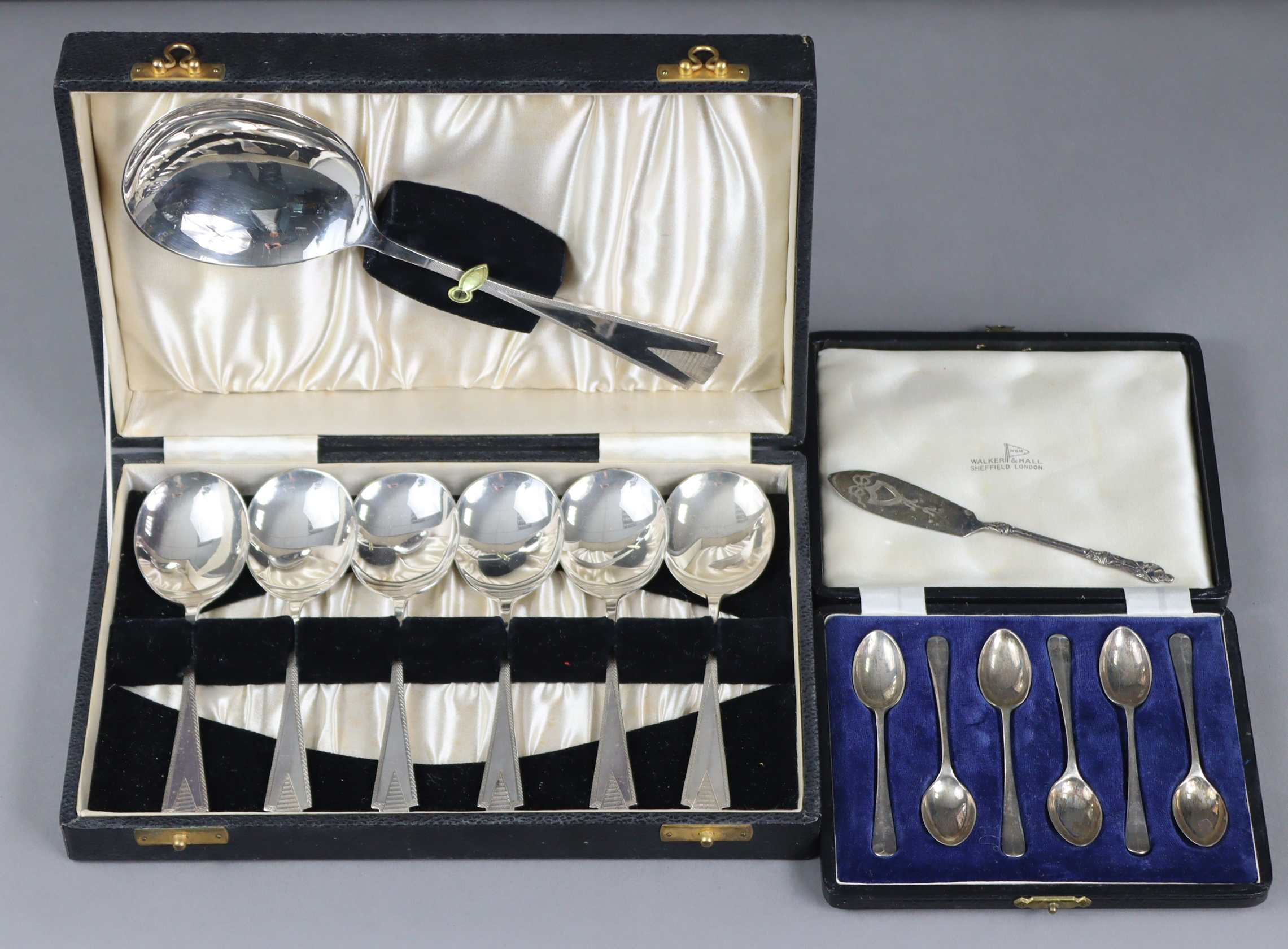 A set of six silver Hanoverian teaspoons, Sheffield 1931, by Walker & Hall, in fitted case (1.67