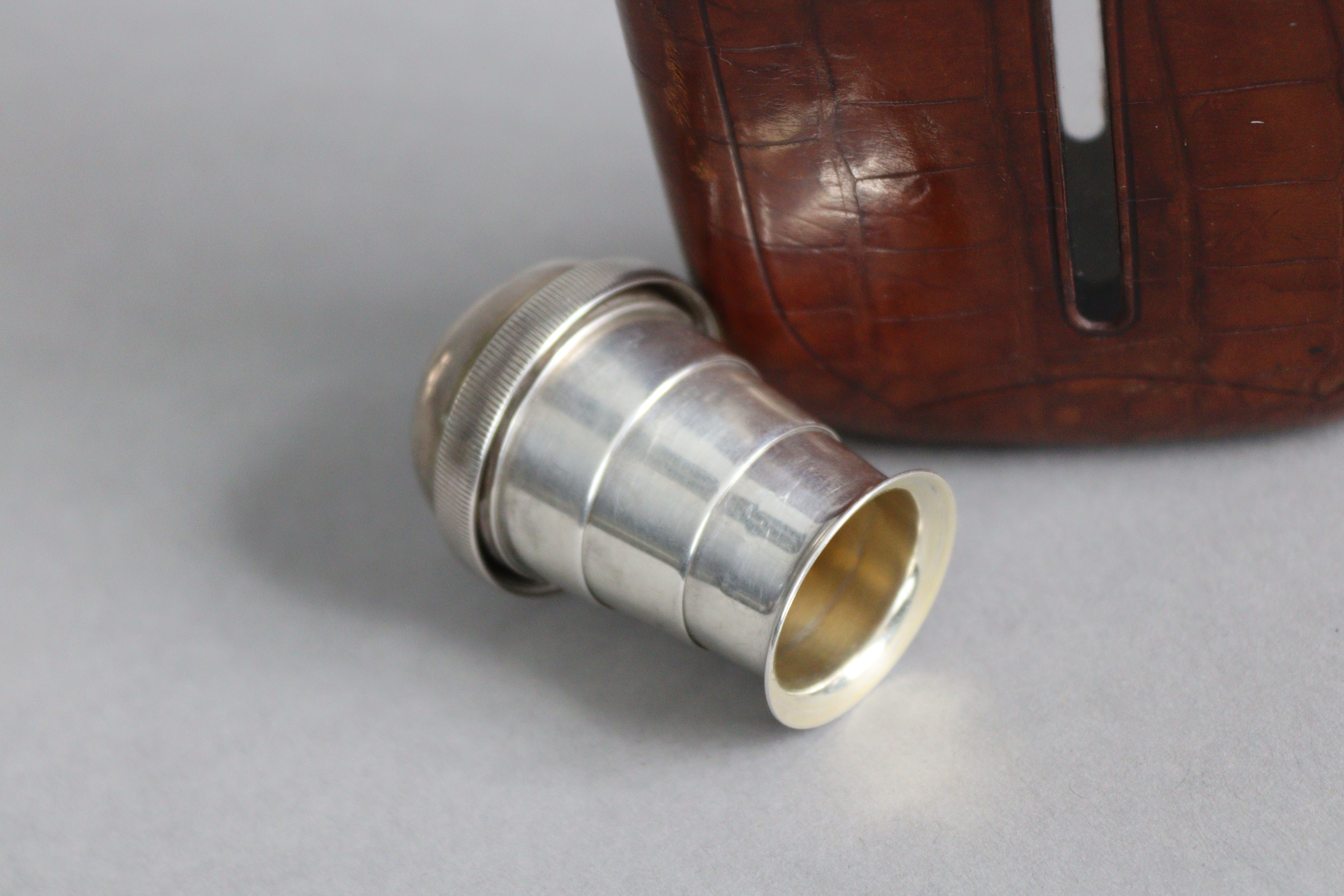 A George V NOVELTY SILVER-MOUNT GLASS SPIRIT FLASK, covered in tan crocodile skin case, the silver - Image 3 of 4