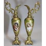 A PAIR OF 19th century BOHEMIAN GREEN GLASS SLENDER OVOID EWERS with gilt-decorated wide borders,