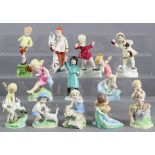 A set of twelve Royal Worcester porcelain “Months of the Year” figures of children modelled by Freda