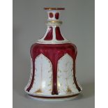 A 19th century Bohemian overlaid glass hookah base, of ruby ground with white opaque overlay &gilt