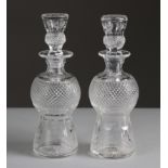 A pair of Edinburgh Crystal Thistle pattern liqueur decanters of thistle shape, 20cm high, each with