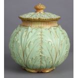 A Grainger’s Worcester pot-pourri jar of round leaf-moulded form, pale green ground with gilt