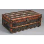 A GOYARD of PARIS STEAMER TRUNK, the exterior with all-over printed design, wooden ribs, leather