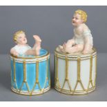 An unusual Royal Worcester porcelain box & cover inn the form of a bass drum, the lid formed as an