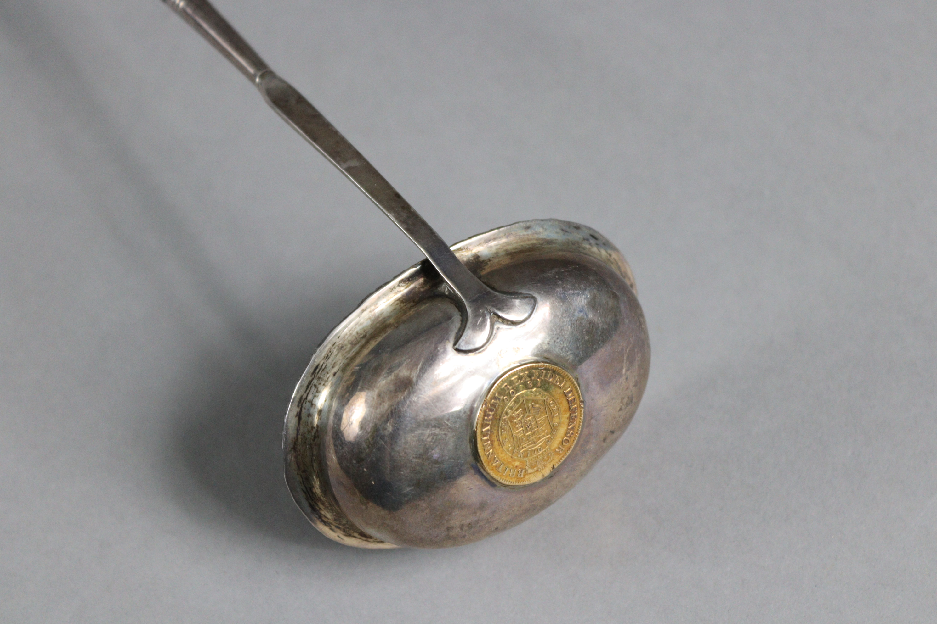 A silver toddy 'coin' ladle with spiral-twist whalebone handle, inset George III half guinea to the - Image 3 of 5