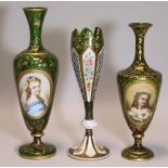 Two 19th century Bohemian green glass slender ovoid vases with narrow necks & gilt leaf-scroll