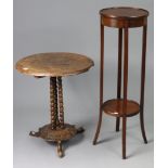 A late 19th century beech circular occasional table on three spiral-twist supports & carved base
