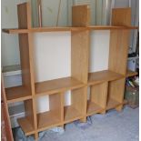 A contemporary bespoke light oak open display unit, 78” long x 68” high.