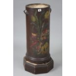 A painted composition cylindrical stick stand on a wooden octagonal plinth, 30” high inscribed "Apri