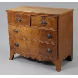 A Georgian mahogany small chest, fitted two short & two long graduated drawers with brass swing